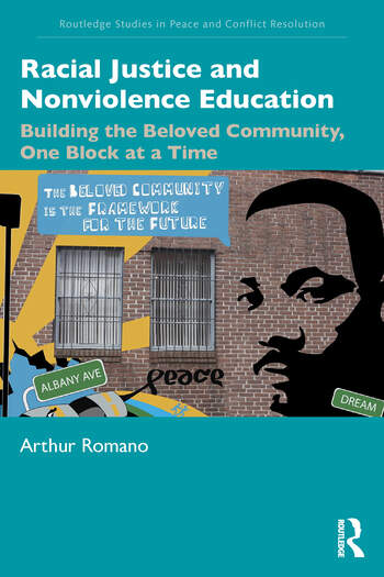 Book cover artwork with a mural of Martin Luther King Jr. and the text, the beloved community is the framework for the future.